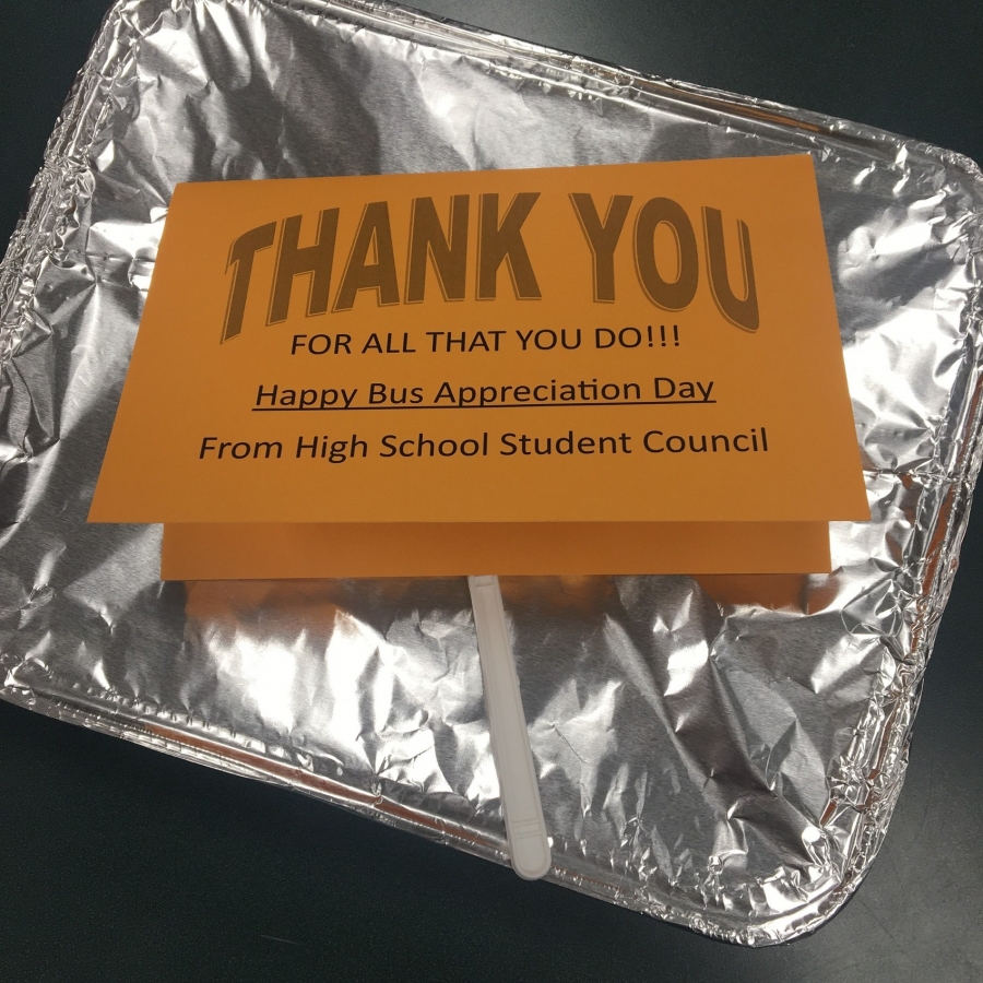 orange thank you tag on a tin foil pan